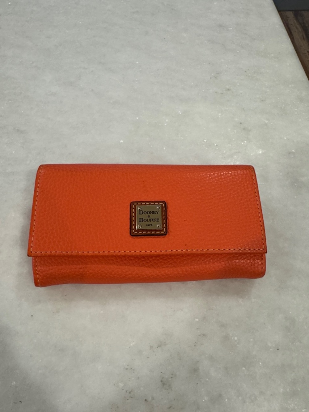 Dooney & Bourke Orange Pebbled Leather Flap Clutch Wallet